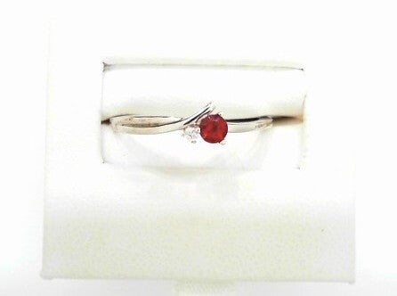 10K WG GARNET & DIAM TWIST BAN