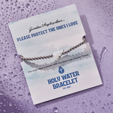 HOLY WATER ANGEL WING BRACELET