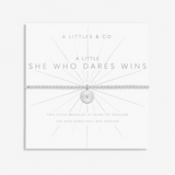 A LITTLE SHE WHO DARES WINS