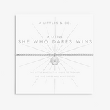 A LITTLE SHE WHO DARES WINS