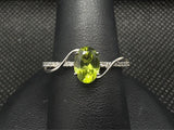 10K WG AND PERIDOT RING W/DIAM