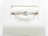 10K WHITE ZIRCON AND DIA TWIST