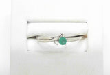 10K EMERALD AND DIA TWIST BAND