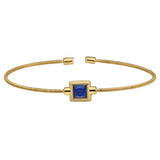 Gold Finish Sterling Silver Cable Cuff Bracelet With Princess Cut Simulated Sapphire Birth Gem